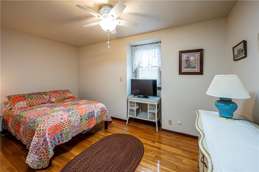 361 Middletown Road New Stanton, PA 15672 - Photo 24 of 43 a bedroom with a bed and a flat screen tv