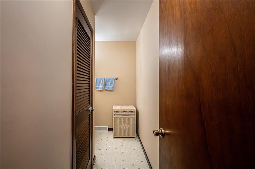 361 Middletown Road New Stanton, PA 15672 - Photo 27 of 43 a bathroom with a toilet and a shower curtain