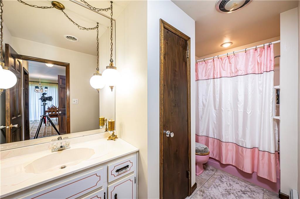 361 Middletown Road New Stanton, PA 15672 - Photo 36 of 43 a bathroom with a sink vanity and a mirror
