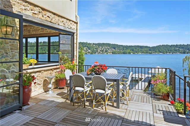 a view of a chairs and table on the terrace
