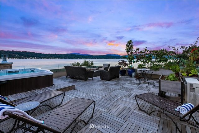 a terrace of a house with outdoor seating