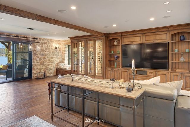 a bathroom with a sink and a large mirror