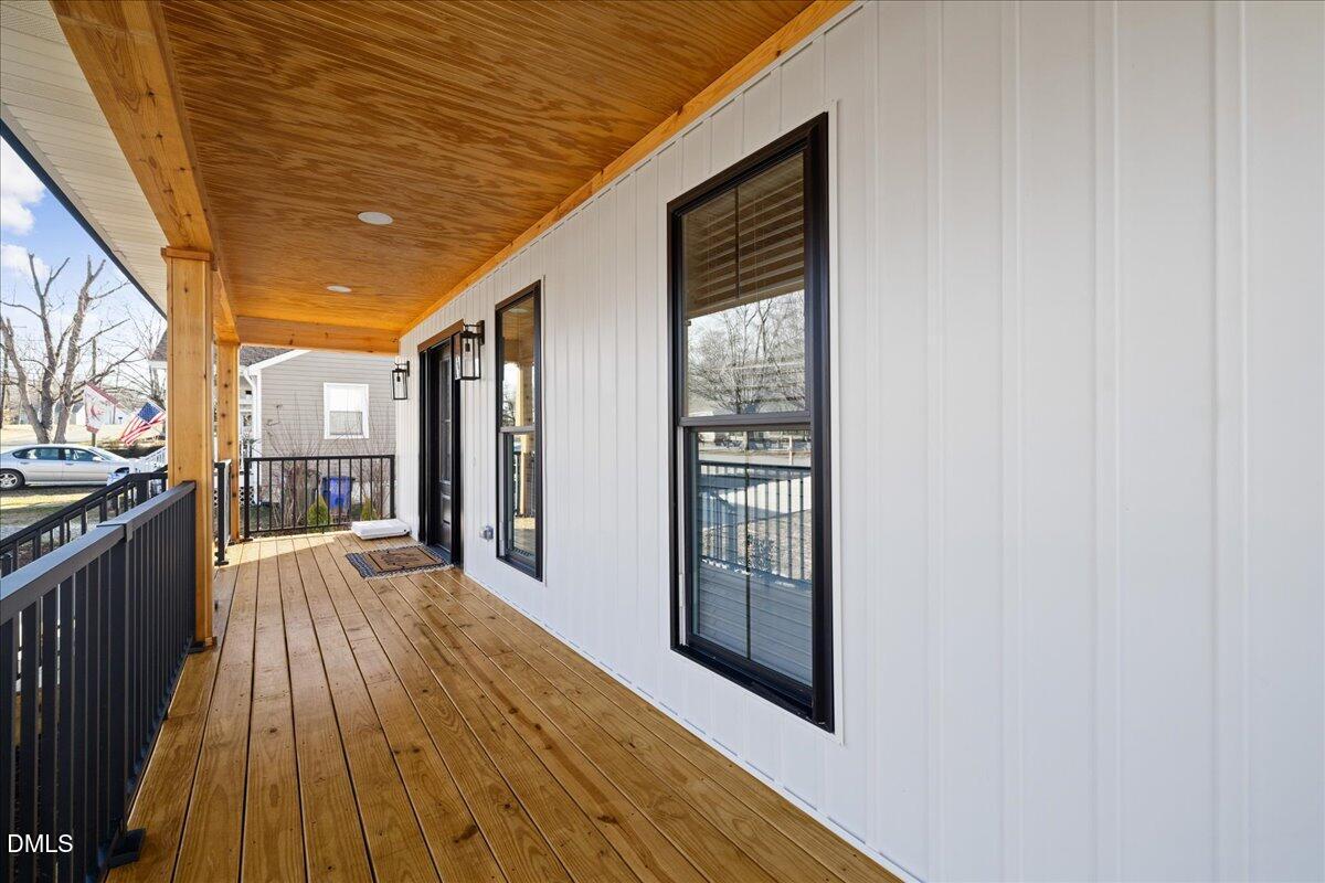 617 North 3rd Street Mebane, NC 27302 - Photo 8 of 50 a view of a patio with wooden floor and door