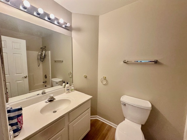 122 Enclave Circle, Unit D Bolingbrook, IL 60440 - Photo 14 of 20 a bathroom with a sink mirror vanity and toilet