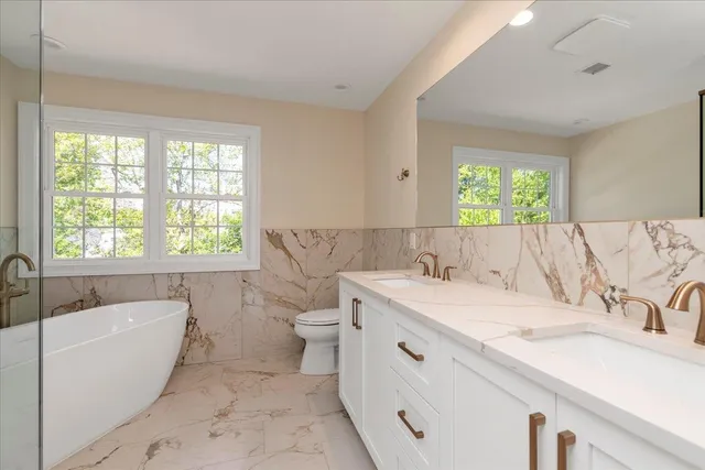 a bathroom with a sink and a bathtub