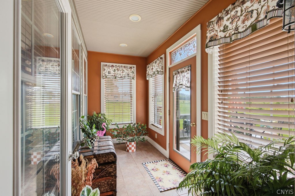 321 West Lake Road Oswego, NY 13126 - Photo 16 of 49 Another view of this beautiful sunroom that walks