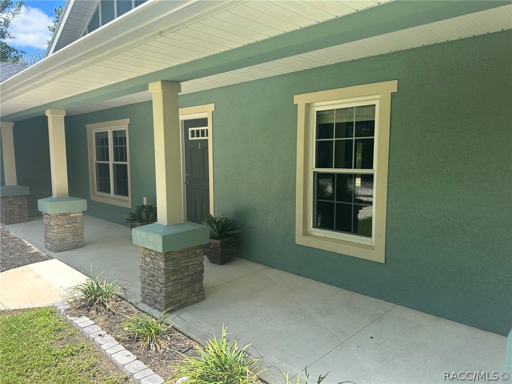 8434 North Vardon Road Citrus Springs, FL 34434 - Photo 3 of 29 Beautiful covered front porch