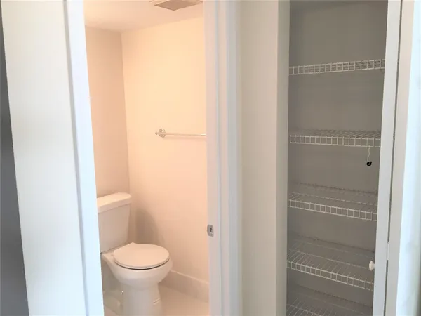 a bathroom with a toilet