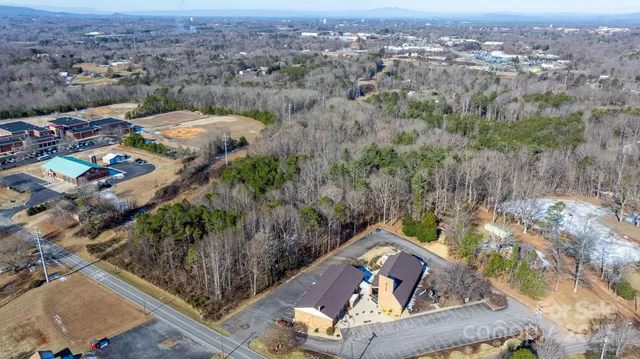 an aerial view of a house with a garden