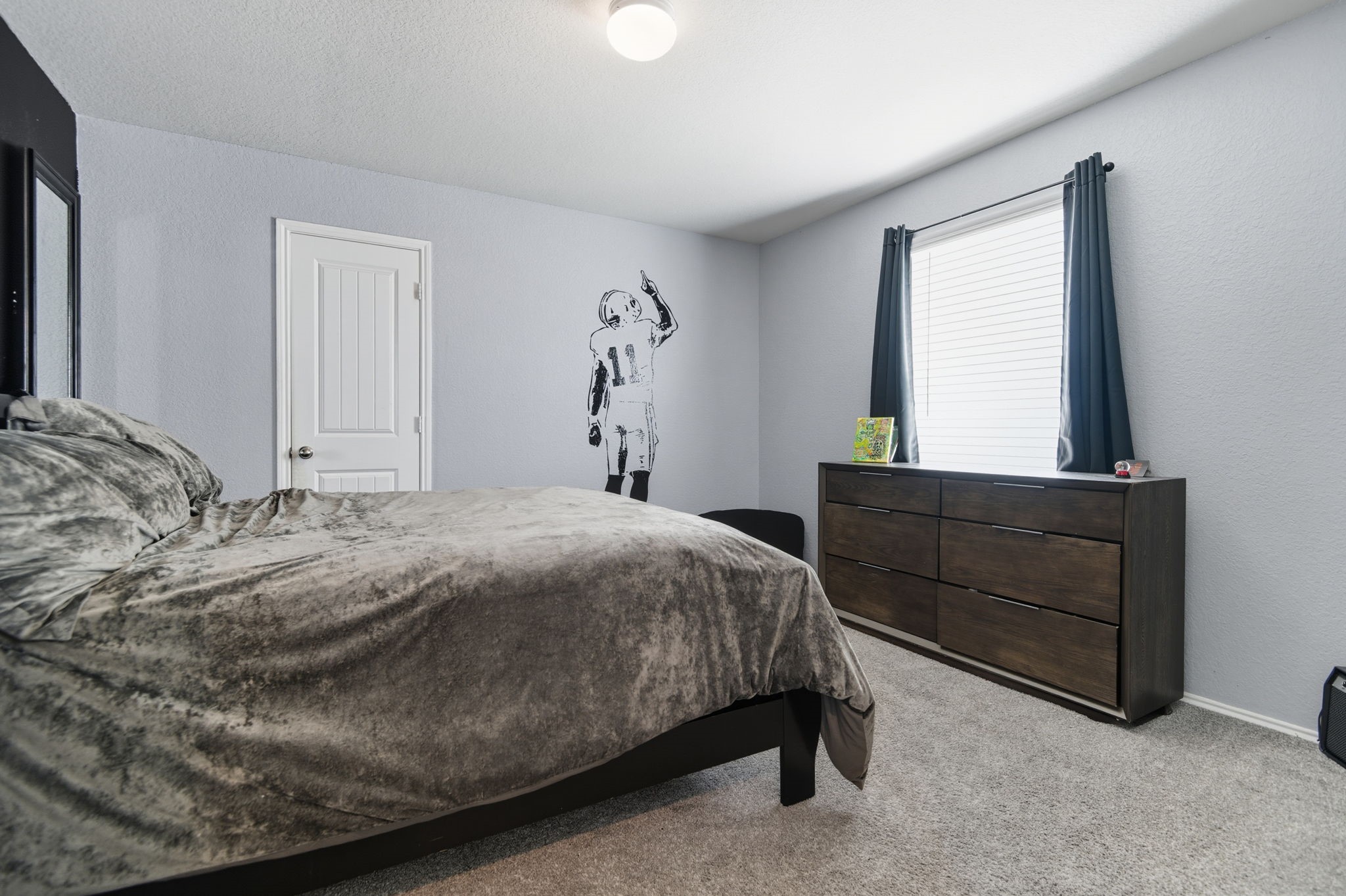 935 Bright Lotus Lane Rosharon, TX 77583 - Photo 11 of 18 a bedroom with a bed and window