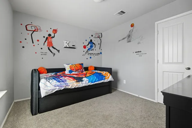 a living room with furniture and a couch