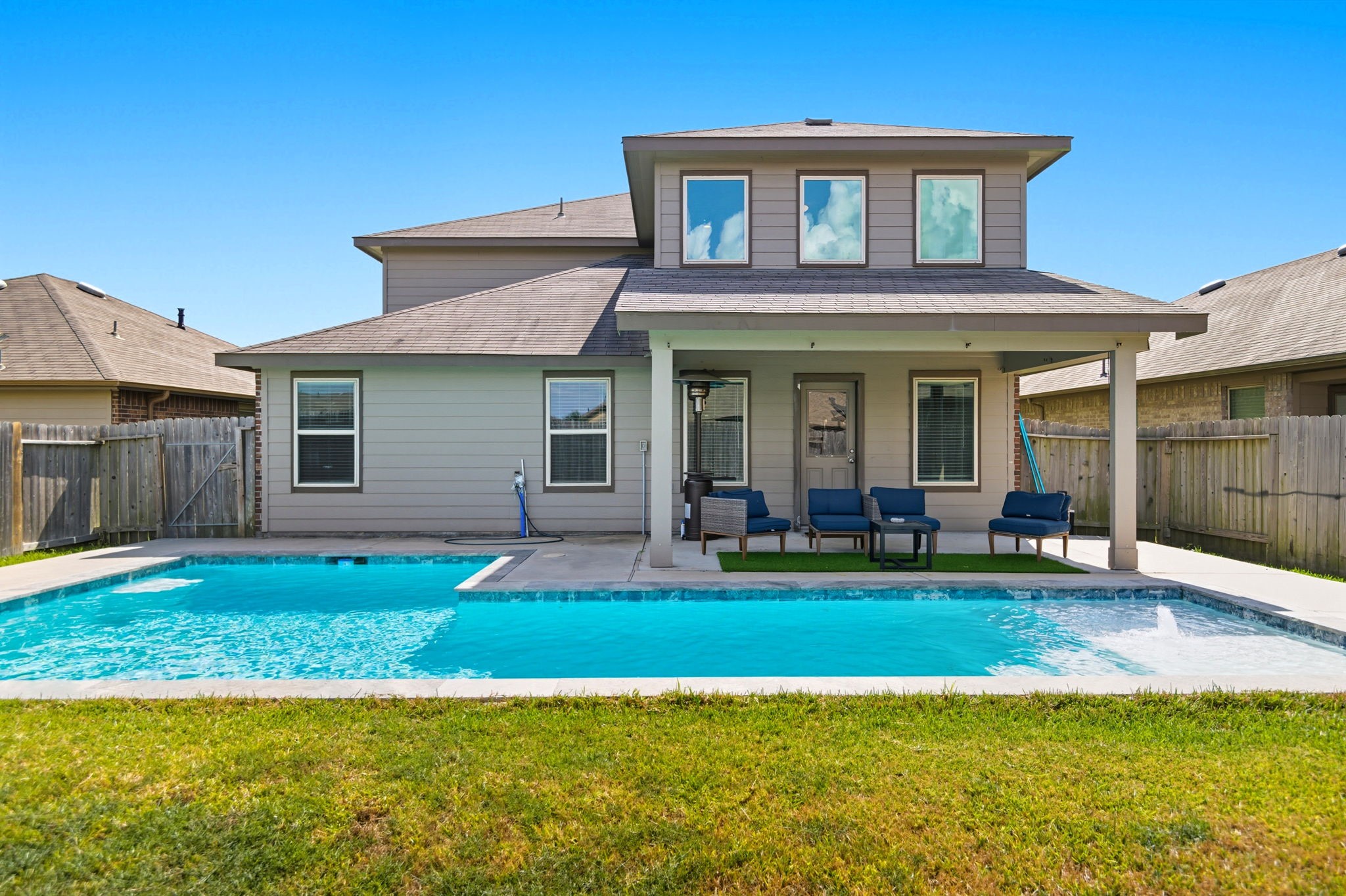 935 Bright Lotus Lane Rosharon, TX 77583 - Photo 16 of 18 a view of a house with swimming pool and a yard
