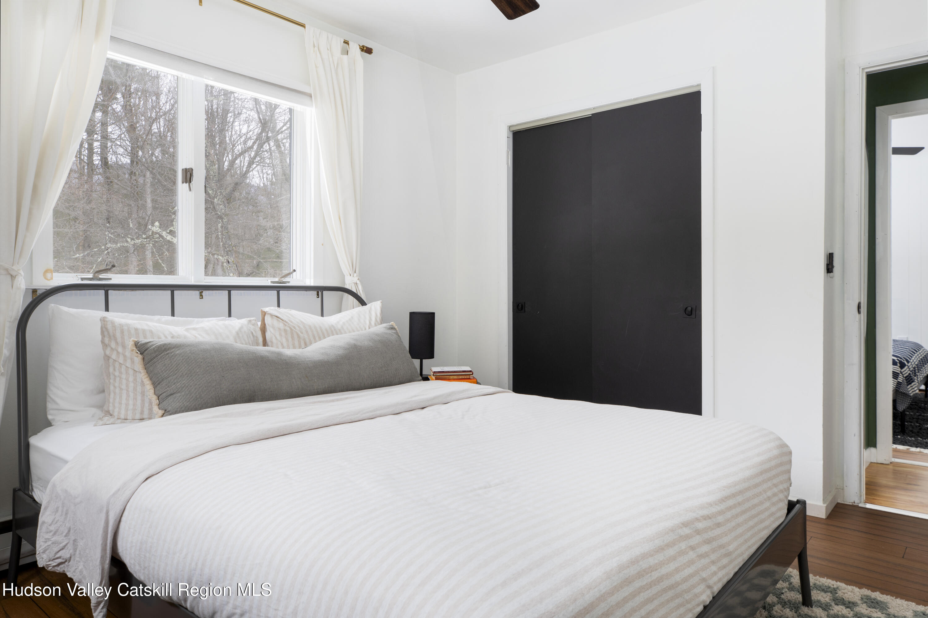 26 Krom Road Olivebridge, NY 12461 - Photo 16 of 24 a bedroom with a large bed and a window