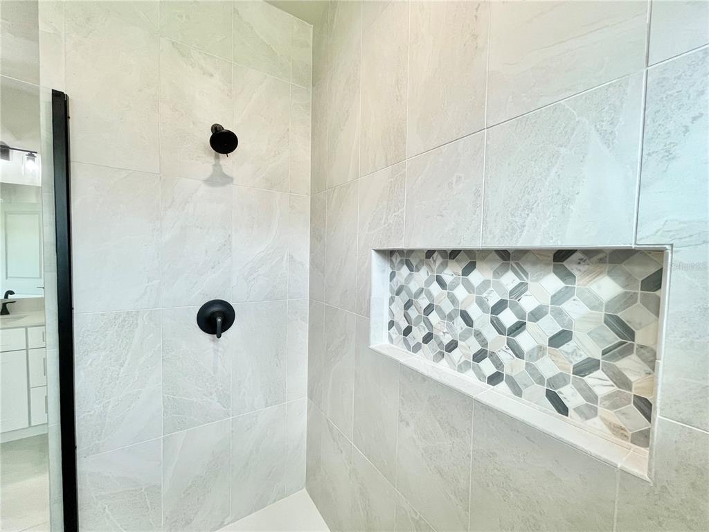 1021 Southwest 67th Street Gainesville, FL 32607 - Photo 20 of 53 a bathroom with a shower