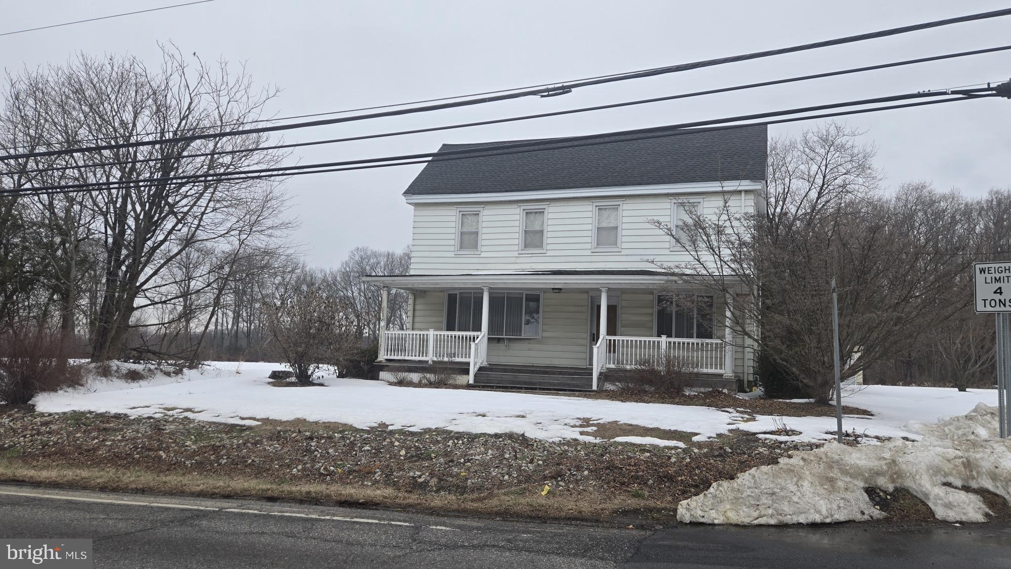 10 Garwin Road Swedesboro, NJ 08085 - Photo 2 of 13 a view of a house with a snow on the road