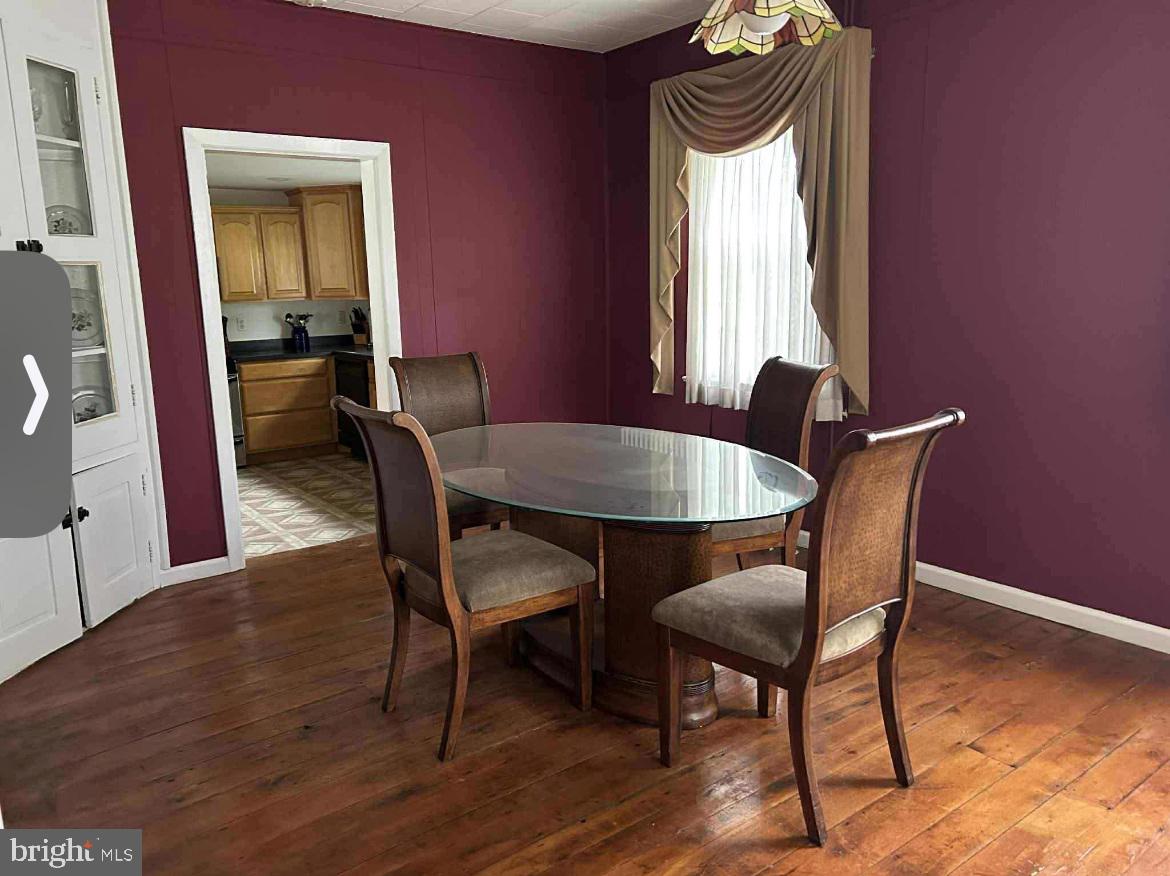 10 Garwin Road Swedesboro, NJ 08085 - Photo 9 of 13 a dining room with furniture window and wooden floor