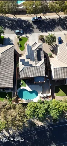 a view of a patio with a yard