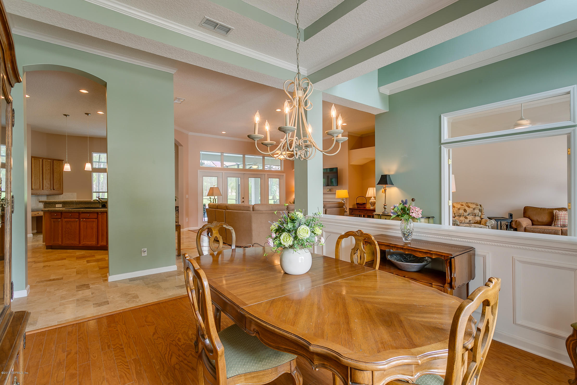 1925 Lyndhurst Drive St. Augustine, FL 32092 - Photo 22 of 52 a dining room with furniture and chandelier
