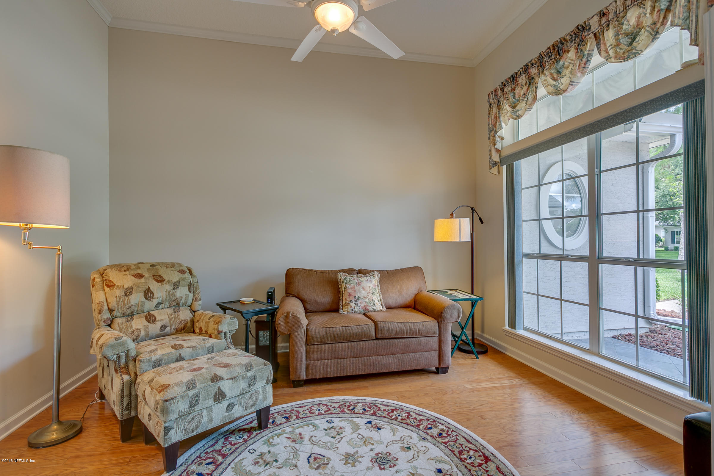 1925 Lyndhurst Drive St. Augustine, FL 32092 - Photo 24 of 52 a living room with furniture and a window