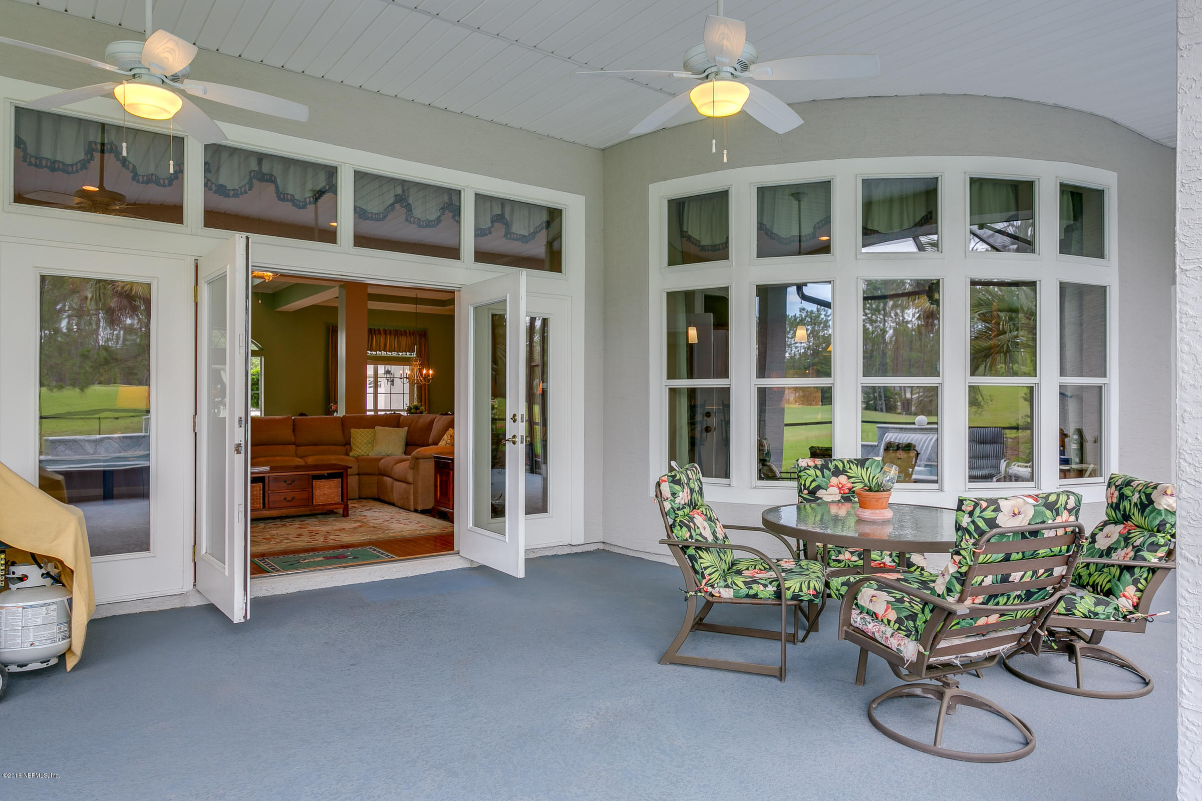 1925 Lyndhurst Drive St. Augustine, FL 32092 - Photo 27 of 52 a dining room with furniture and chandelier