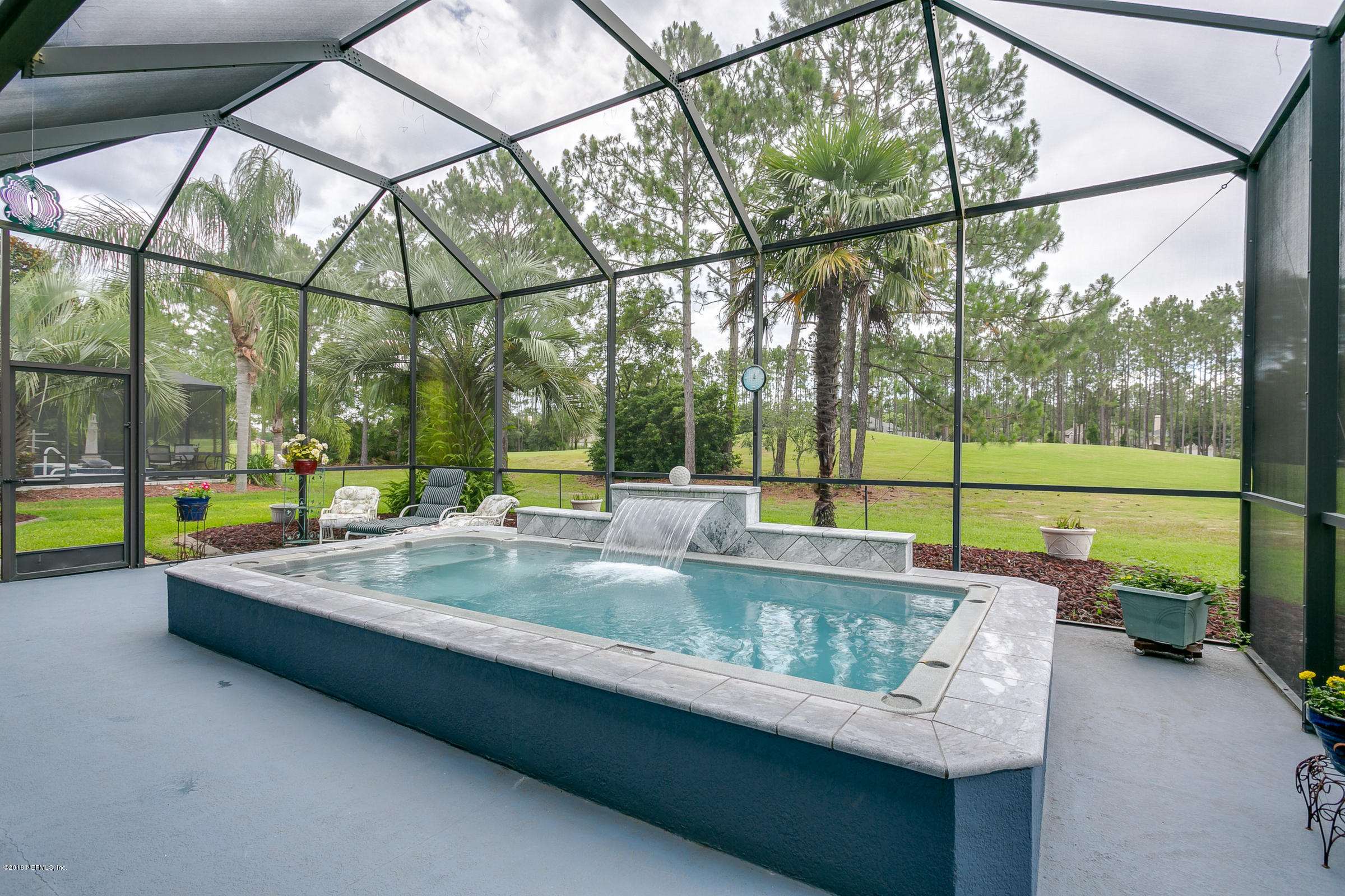 1925 Lyndhurst Drive St. Augustine, FL 32092 - Photo 29 of 52 a view of outdoor space with swimming pool and sitting area