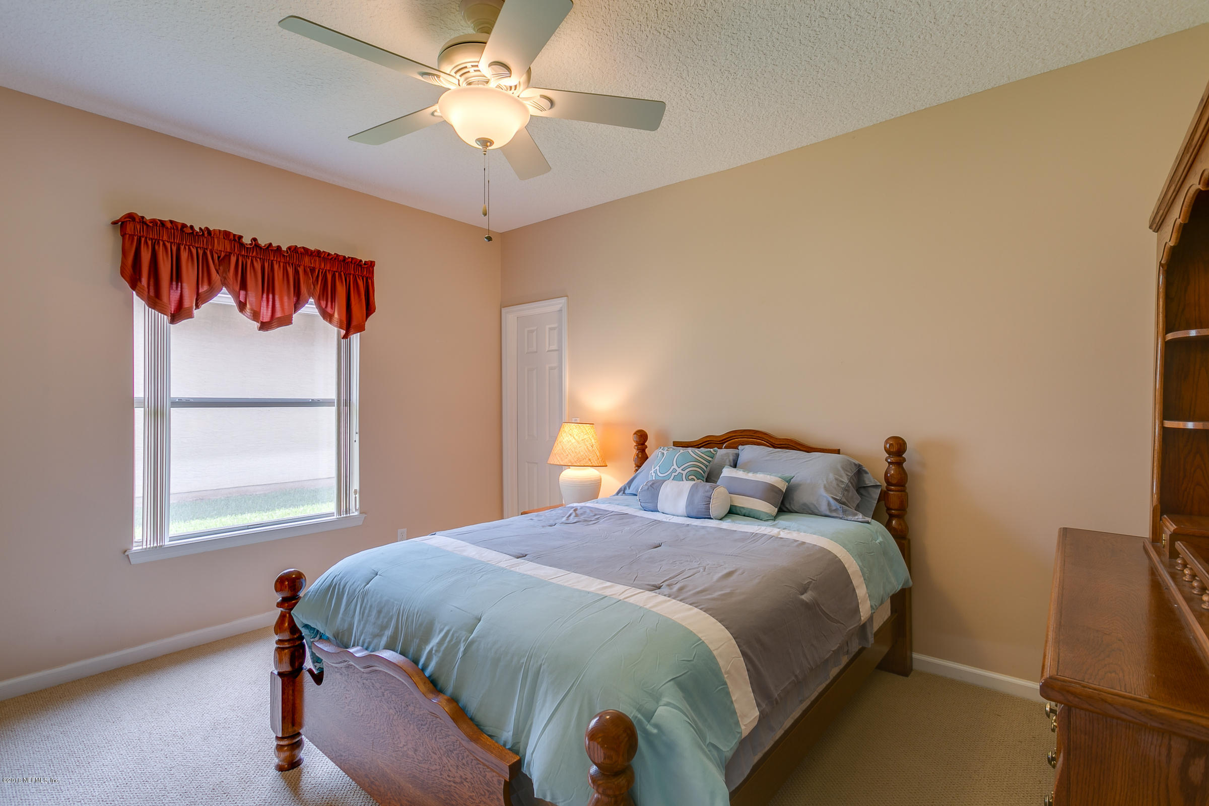 1925 Lyndhurst Drive St. Augustine, FL 32092 - Photo 31 of 52 a bedroom with a bed and window