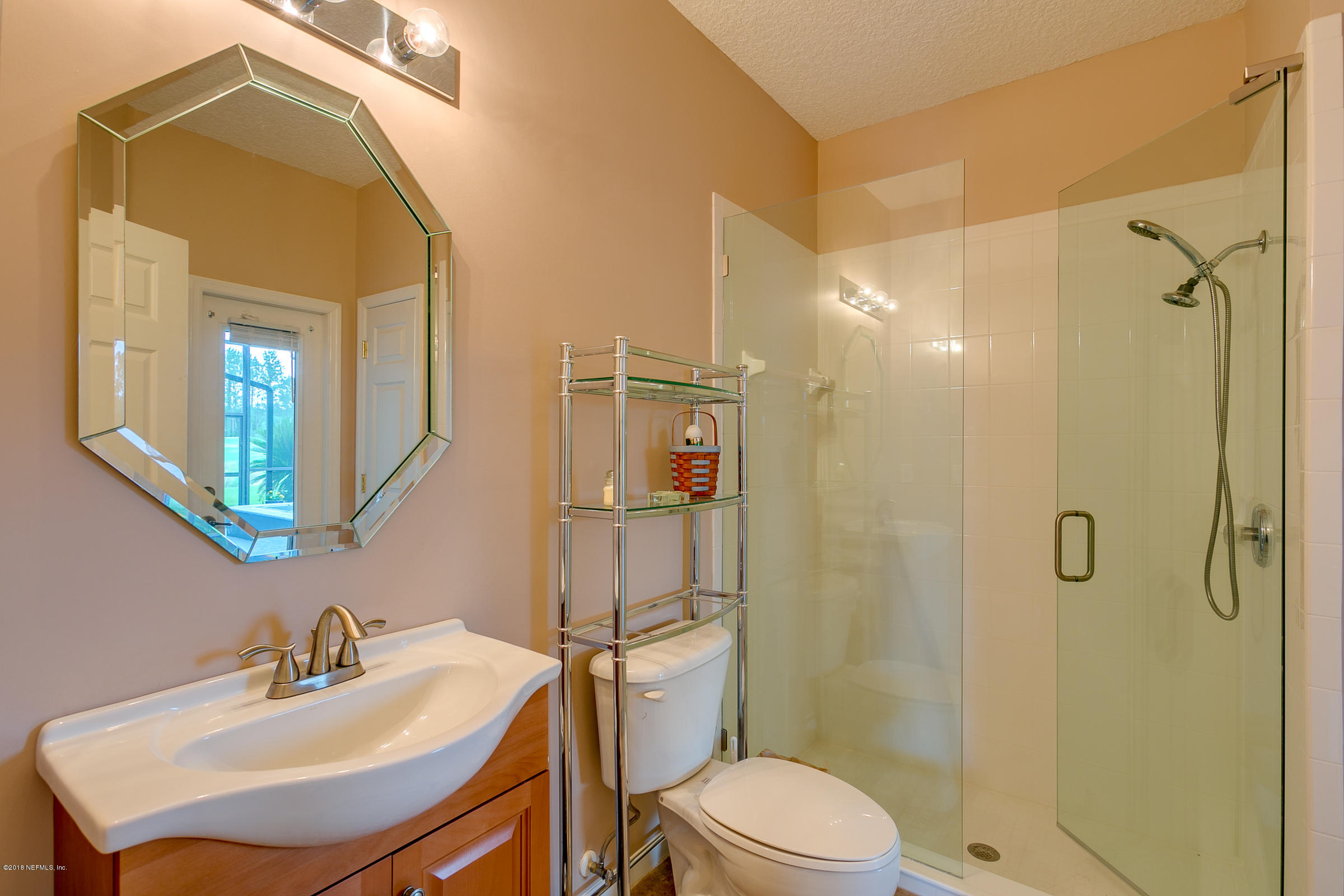 1925 Lyndhurst Drive St. Augustine, FL 32092 - Photo 35 of 52 a bathroom with a sink toilet and shower