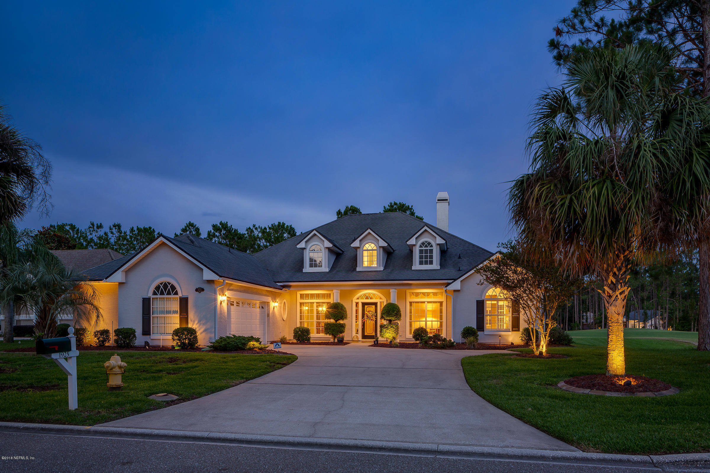 1925 Lyndhurst Drive St. Augustine, FL 32092 - Photo 4 of 52 a front view of a house with garden
