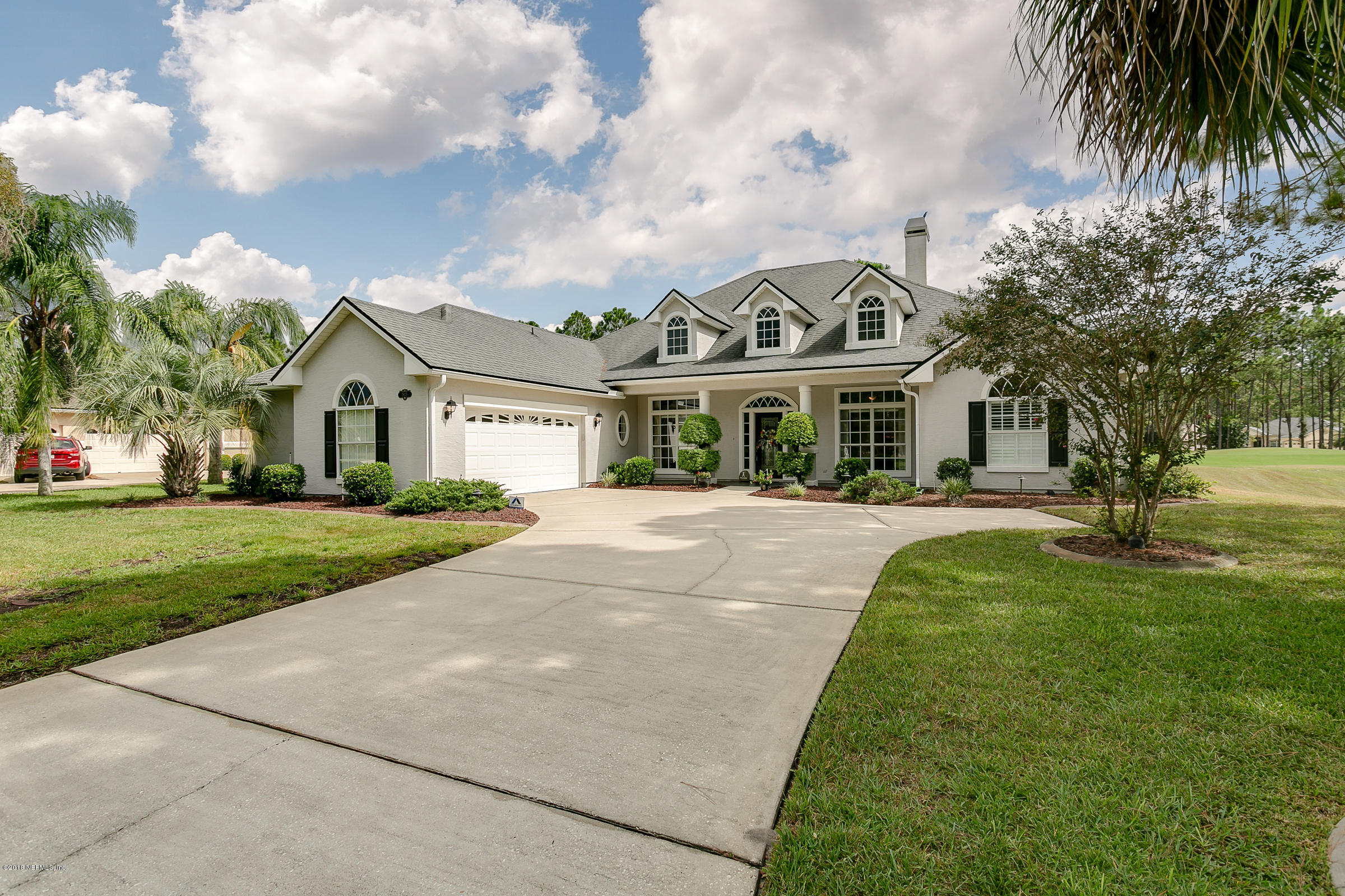 1925 Lyndhurst Drive St. Augustine, FL 32092 - Photo 42 of 52 a front view of a house with a yard