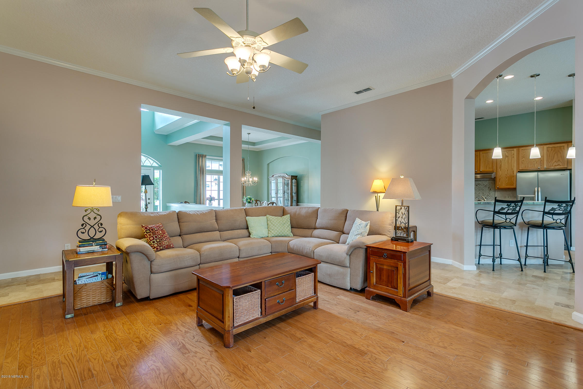 1925 Lyndhurst Drive St. Augustine, FL 32092 - Photo 8 of 52 a living room with furniture and a chandelier
