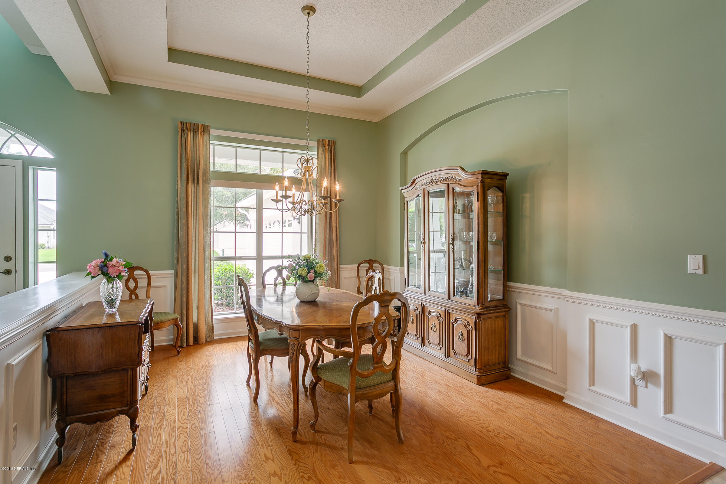 1925 Lyndhurst Drive St. Augustine, FL 32092 - Photo 10 of 52 a view of a dining room with furniture window and wooden floor