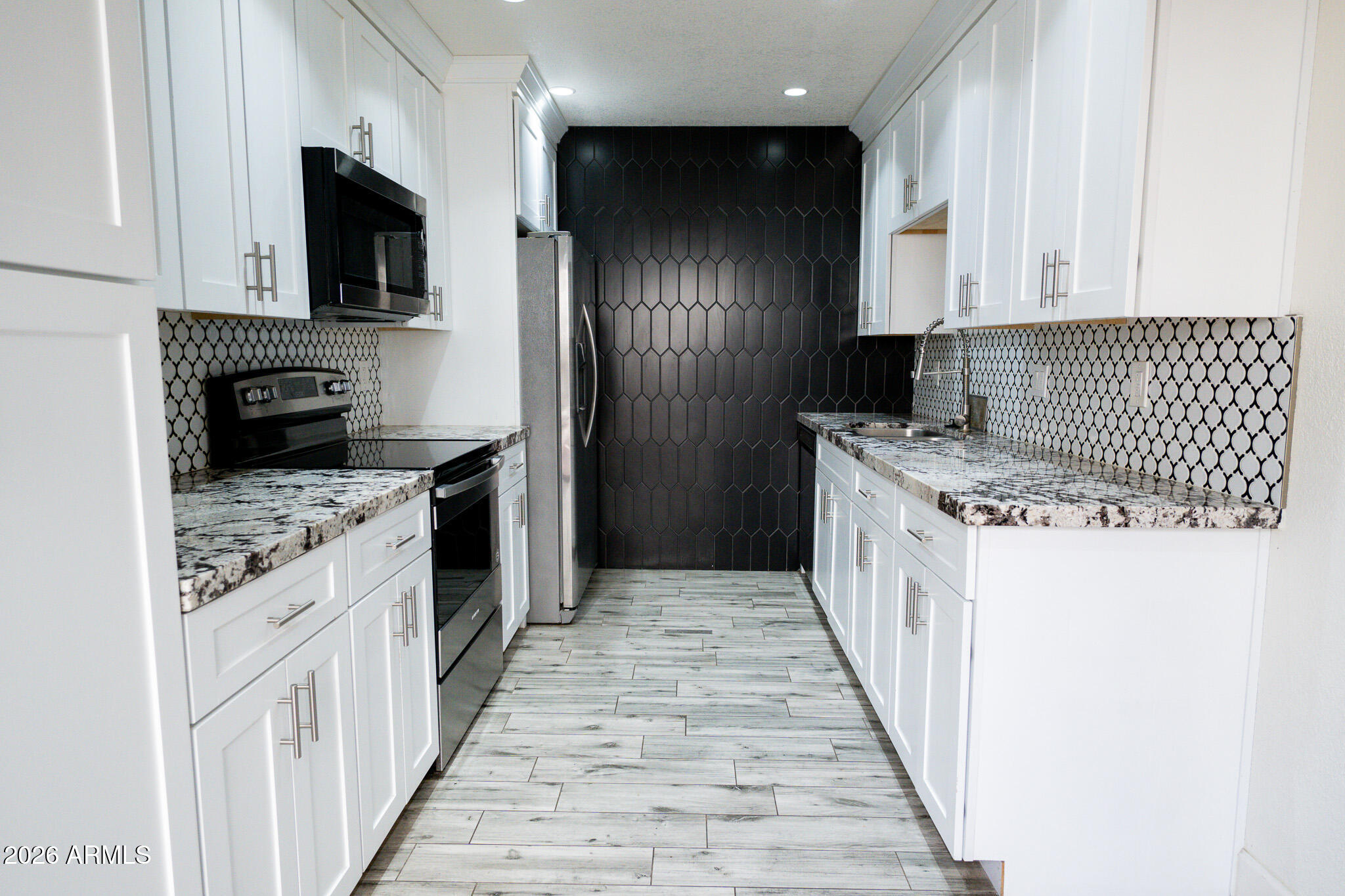 5100 North Miller Road, Unit 3 Scottsdale, AZ 85250 - Photo 11 of 31 a kitchen with a sink stove and refrigerator