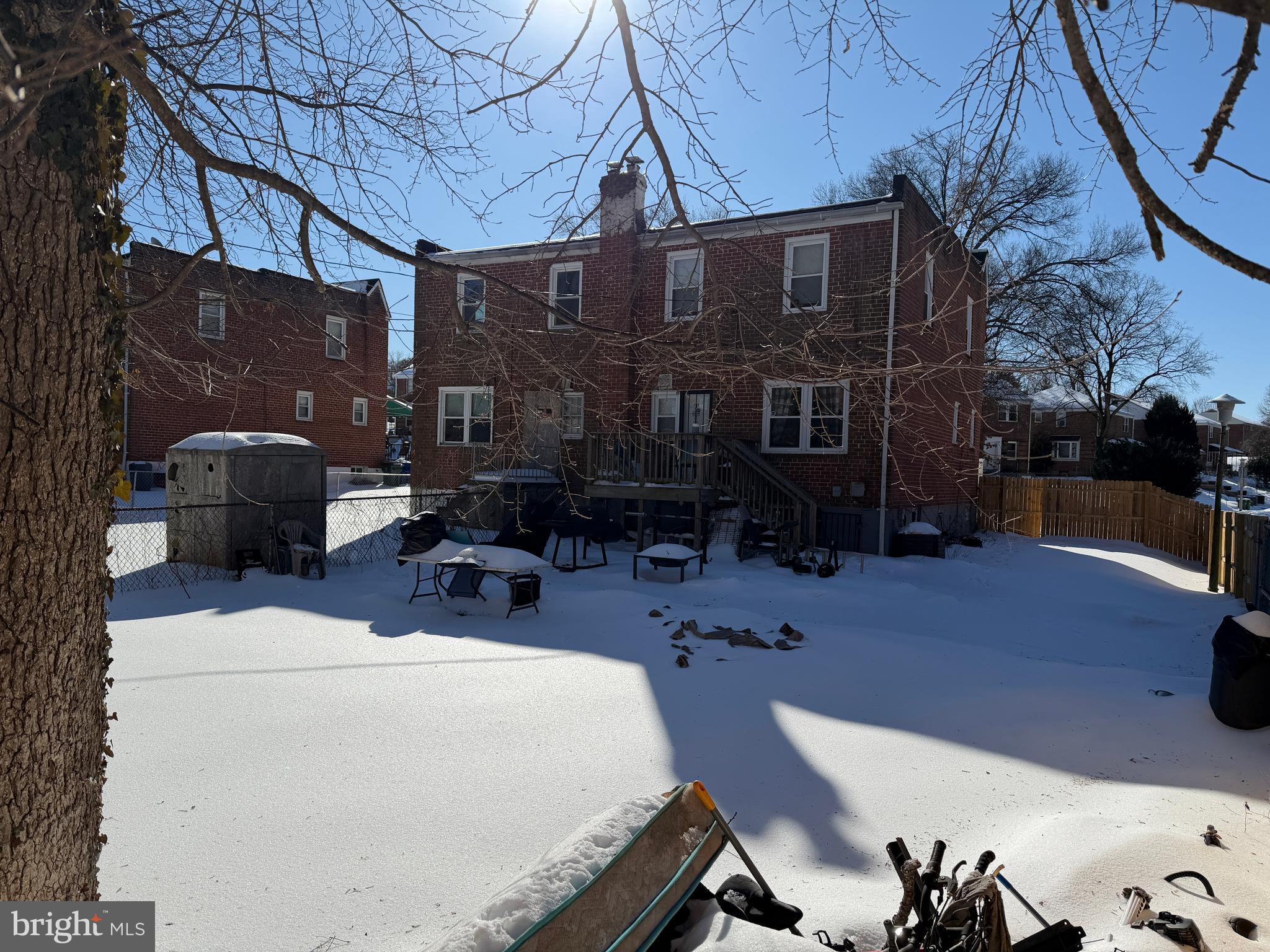 5644 Belle Avenue Baltimore, MD 21207 - Photo 14 of 14 a building outdoor space with patio furniture and potted plants