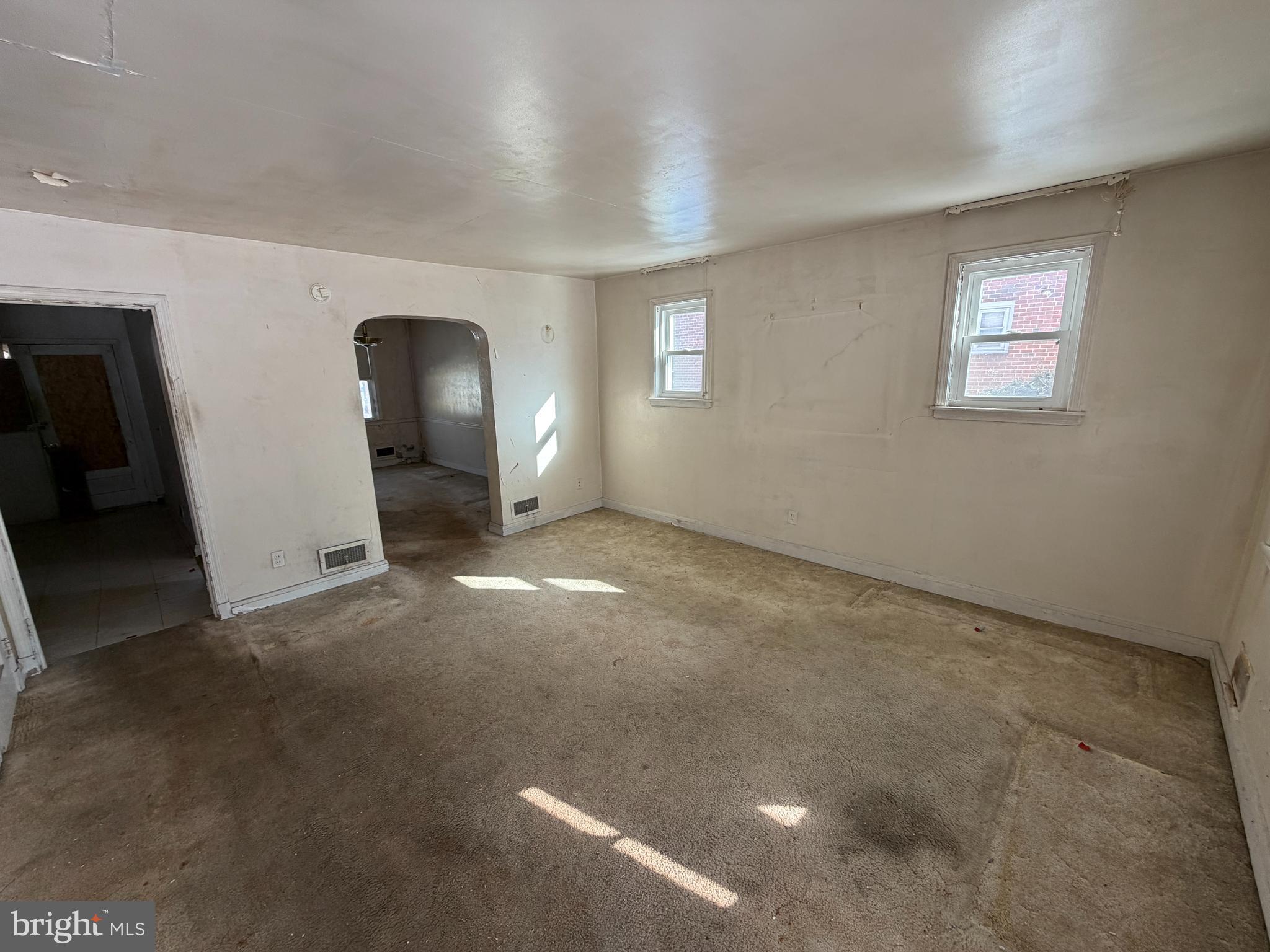 5644 Belle Avenue Baltimore, MD 21207 - Photo 3 of 14 an empty room with windows