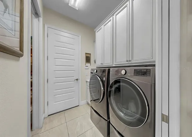 a view of a backyard with sitting area