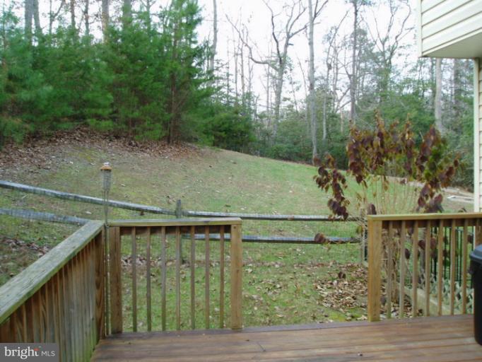 12317 Rashad Circle Lusby, MD 20657 - Photo 23 of 30 Side Yard from Deck