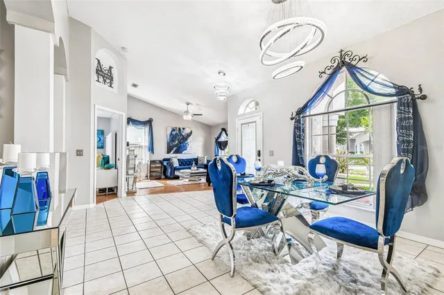 a kitchen with stainless steel appliances a refrigerator a stove a sink and a microwave