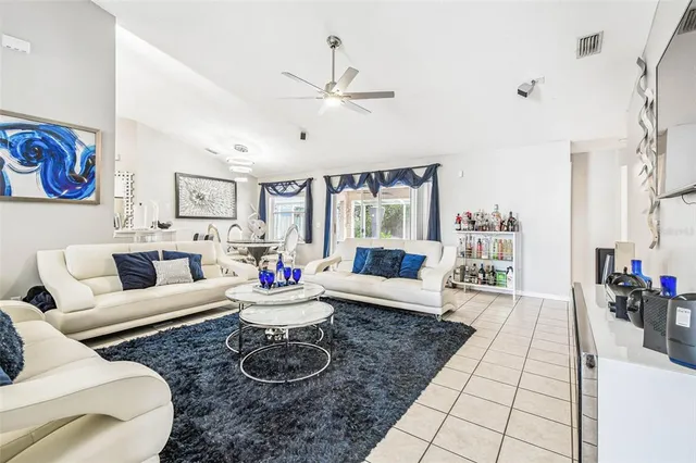 a kitchen with a sink cabinets and window