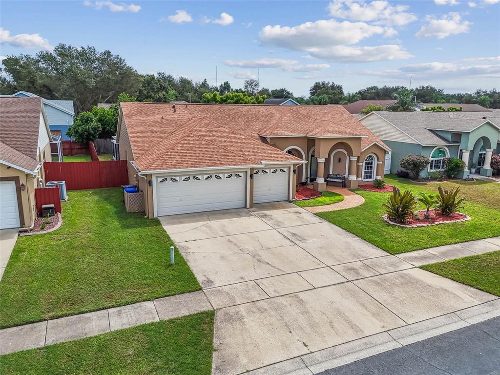 9804 Ocasta Street Riverview, FL 33569 - Photo 69 of 80 an aerial view of a house with a yard