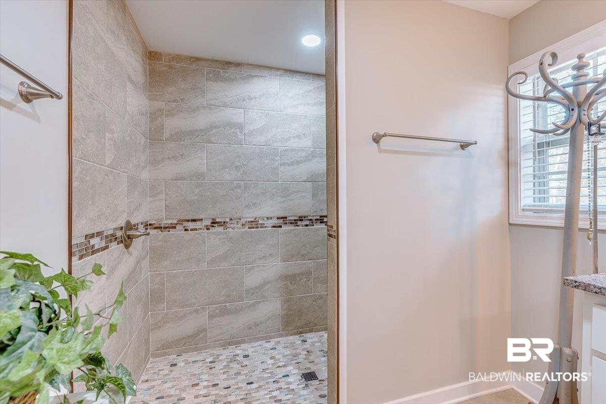 14160 Moffett Road Wilmer, AL 36587 - Photo 26 of 75 Full bathroom with tiled shower