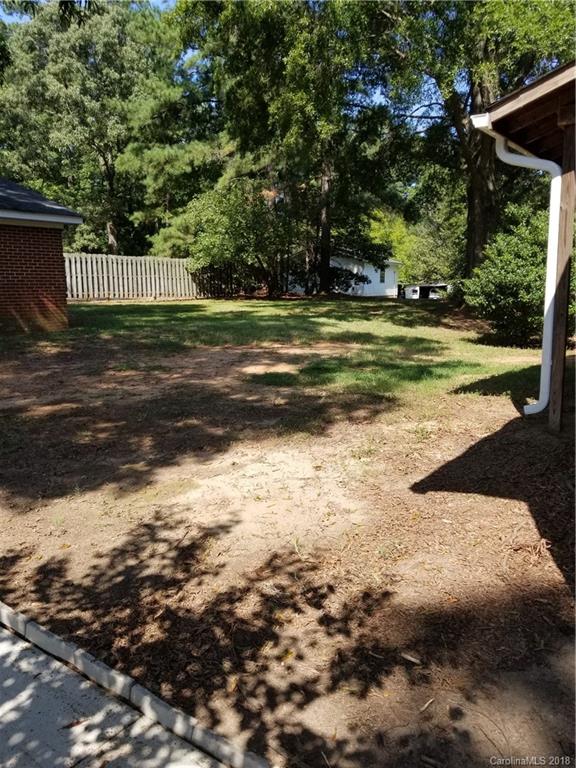 4151 Odell School Road Concord, NC 28027 - Photo 3 of 9 a view of a yard with large trees