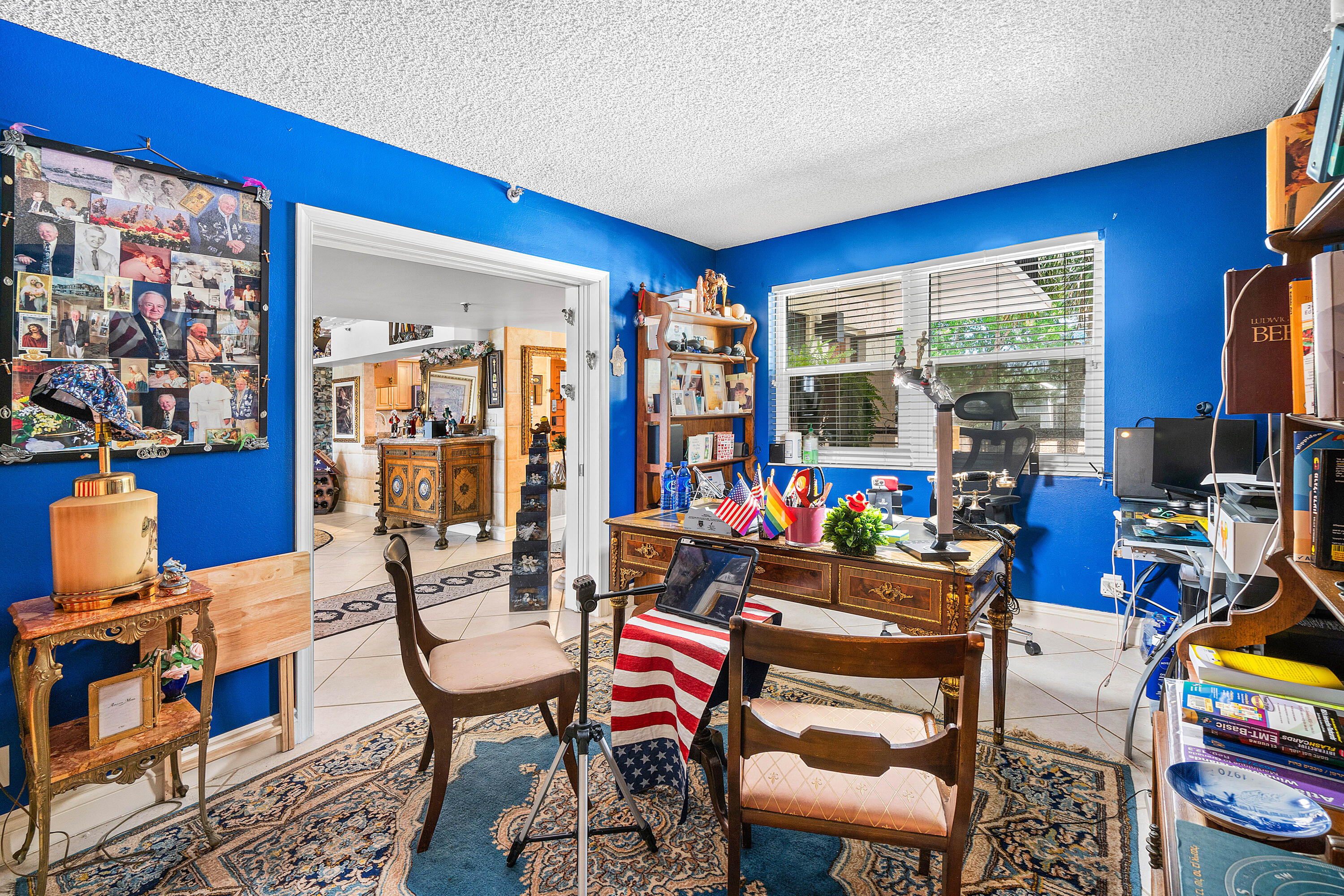 374 Golfview Road, Unit 205 North Palm Beach, FL 33408 - Photo 20 of 35 a living room with furniture a rug and a window