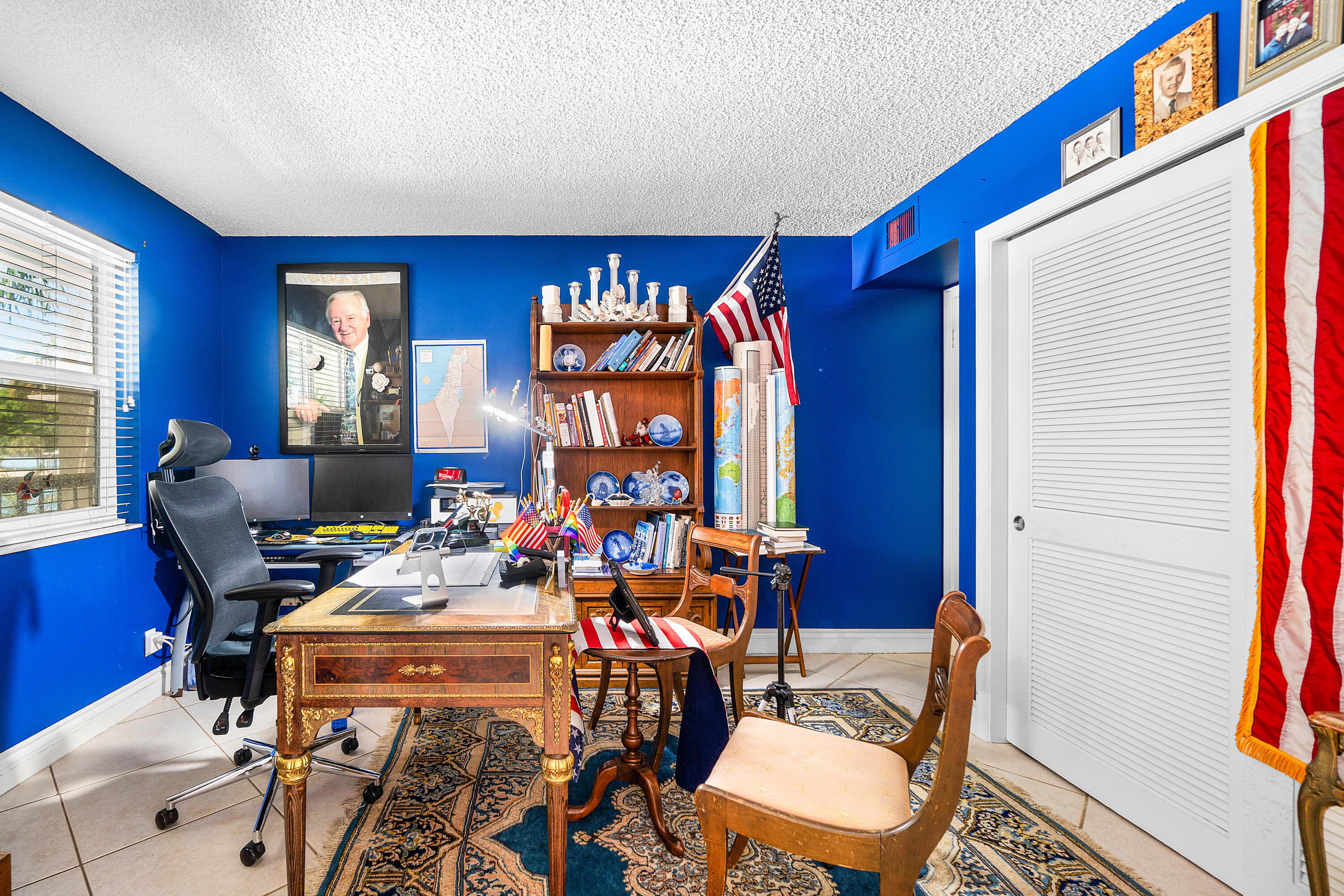 374 Golfview Road, Unit 205 North Palm Beach, FL 33408 - Photo 21 of 35 a room with furniture and a window