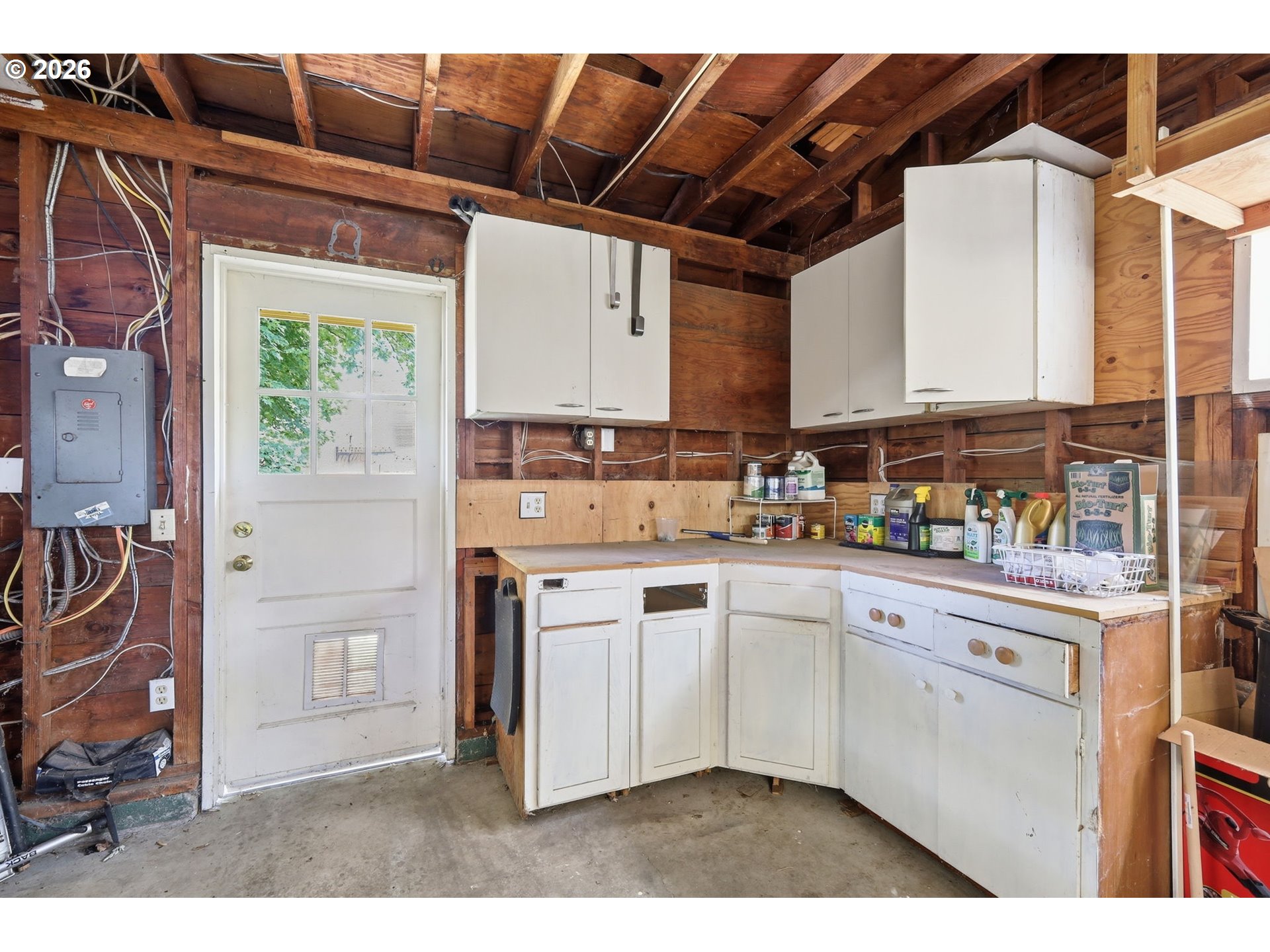 3025 Harris Street Eugene, OR 97405 - Photo 32 of 44 a kitchen with stainless steel appliances a stove a sink and a refrigerator