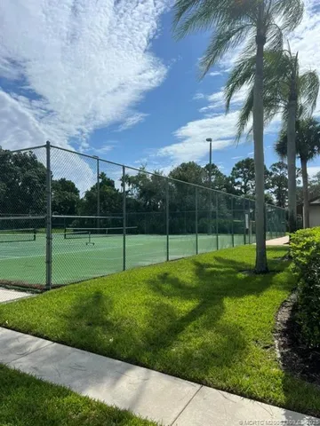 a view of a golf course with a big yard