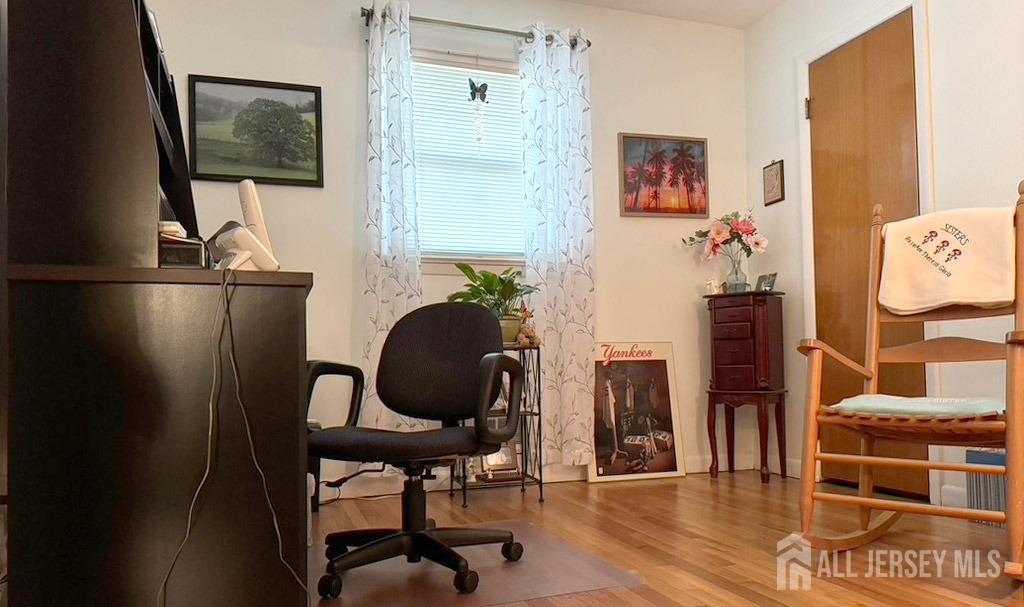 3 Adam Place Milltown, NJ 08850 - Photo 6 of 8 a living room with furniture and a flat screen tv