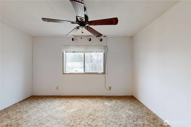 a view of a window in an empty room