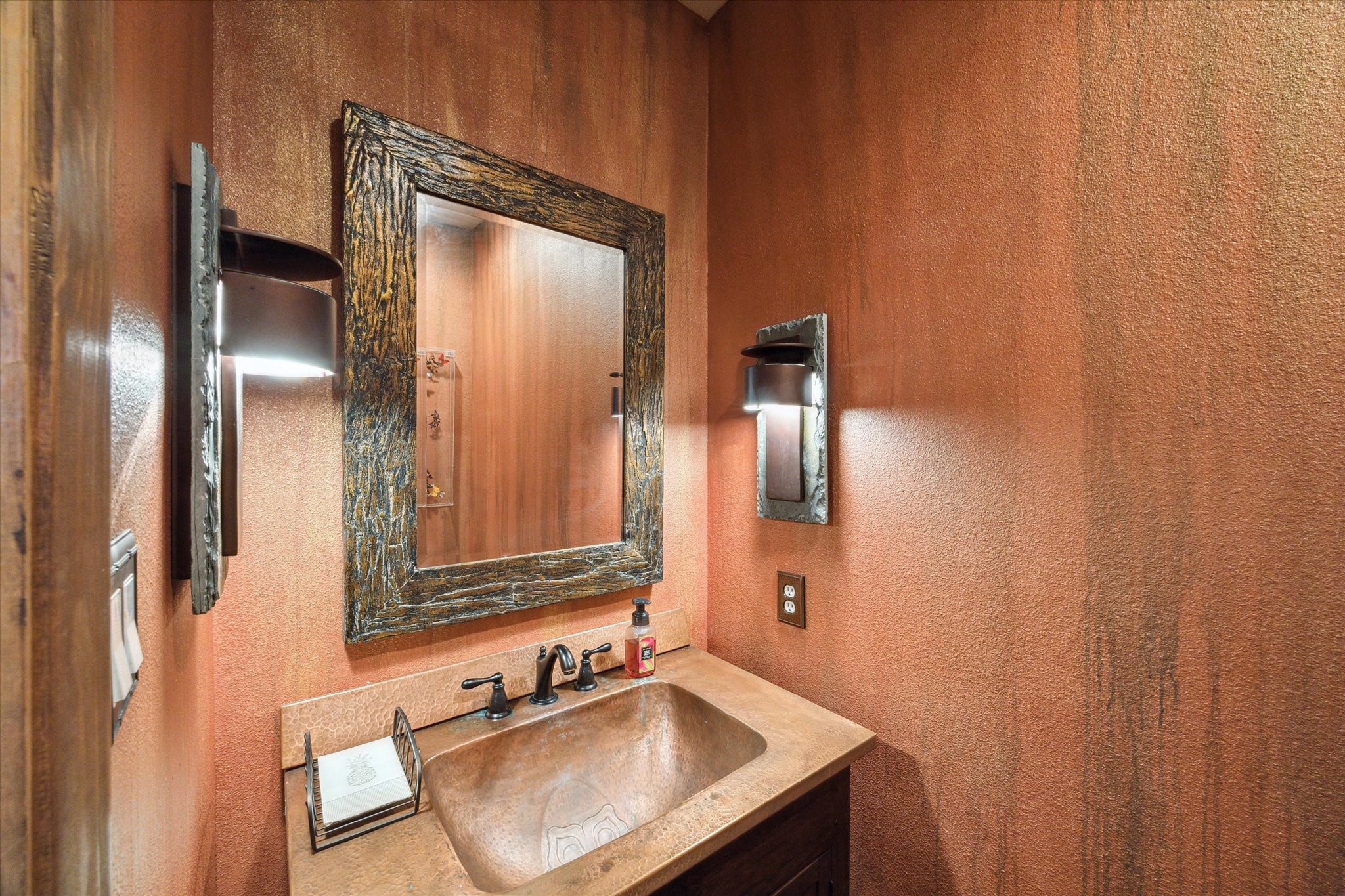 2614 Rip Van Winkle Drive Pearland, TX 77581 - Photo 13 of 31 a bathroom with a sink and a mirror