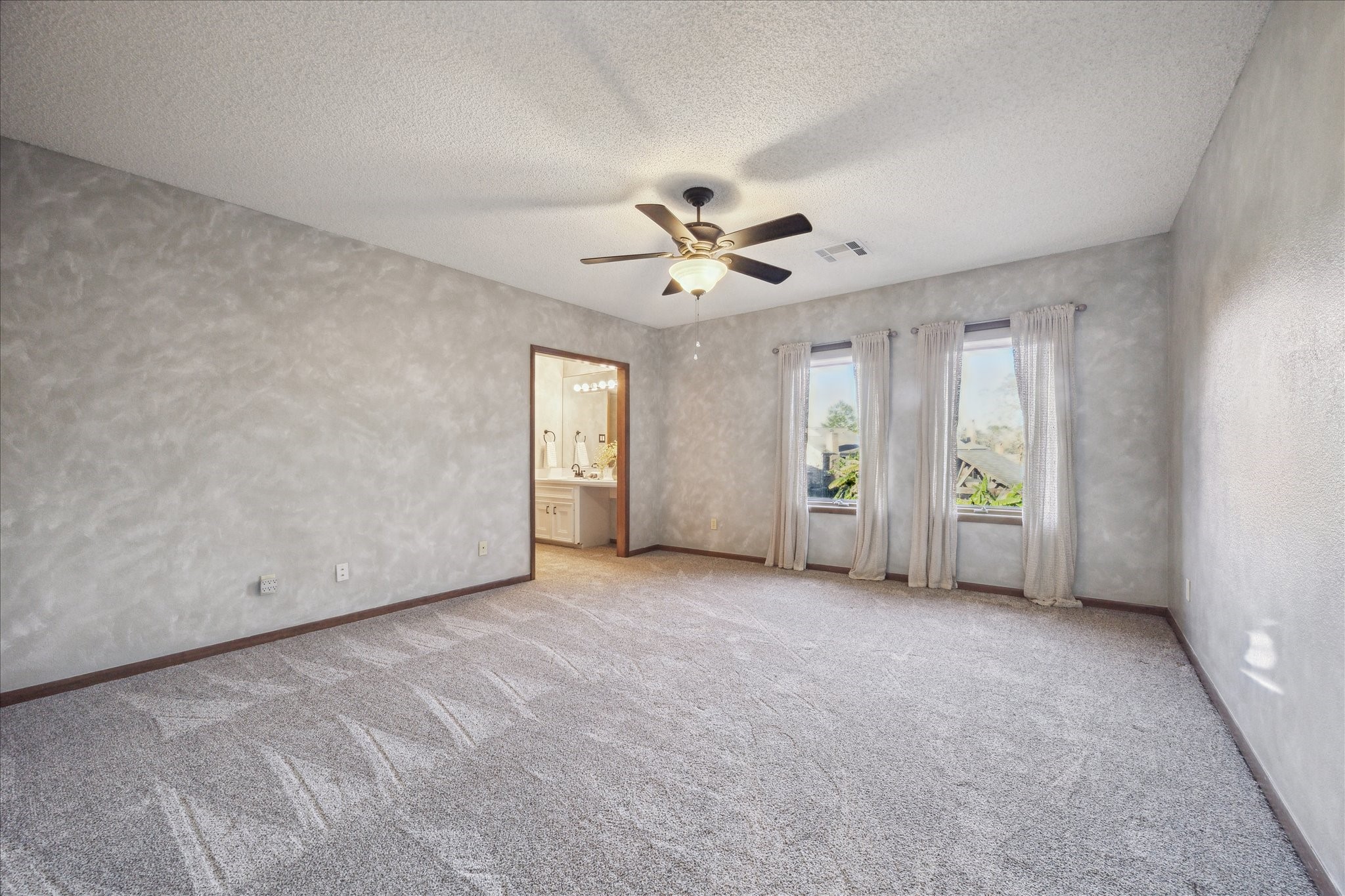 2614 Rip Van Winkle Drive Pearland, TX 77581 - Photo 22 of 31 a view of an empty room with a window