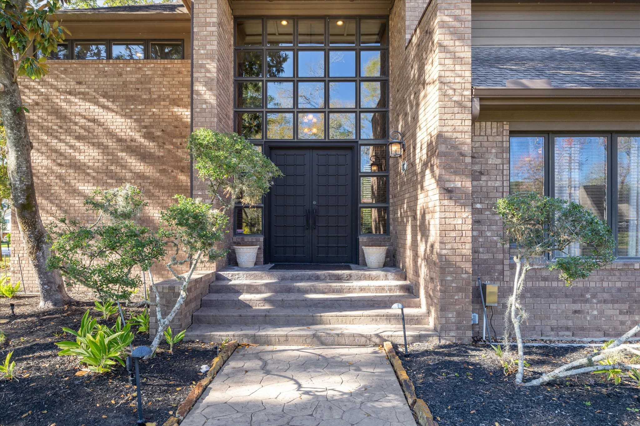 2614 Rip Van Winkle Drive Pearland, TX 77581 - Photo 3 of 31 a front view of a house with a yard